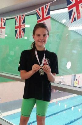 Nia Llewellyn with medal